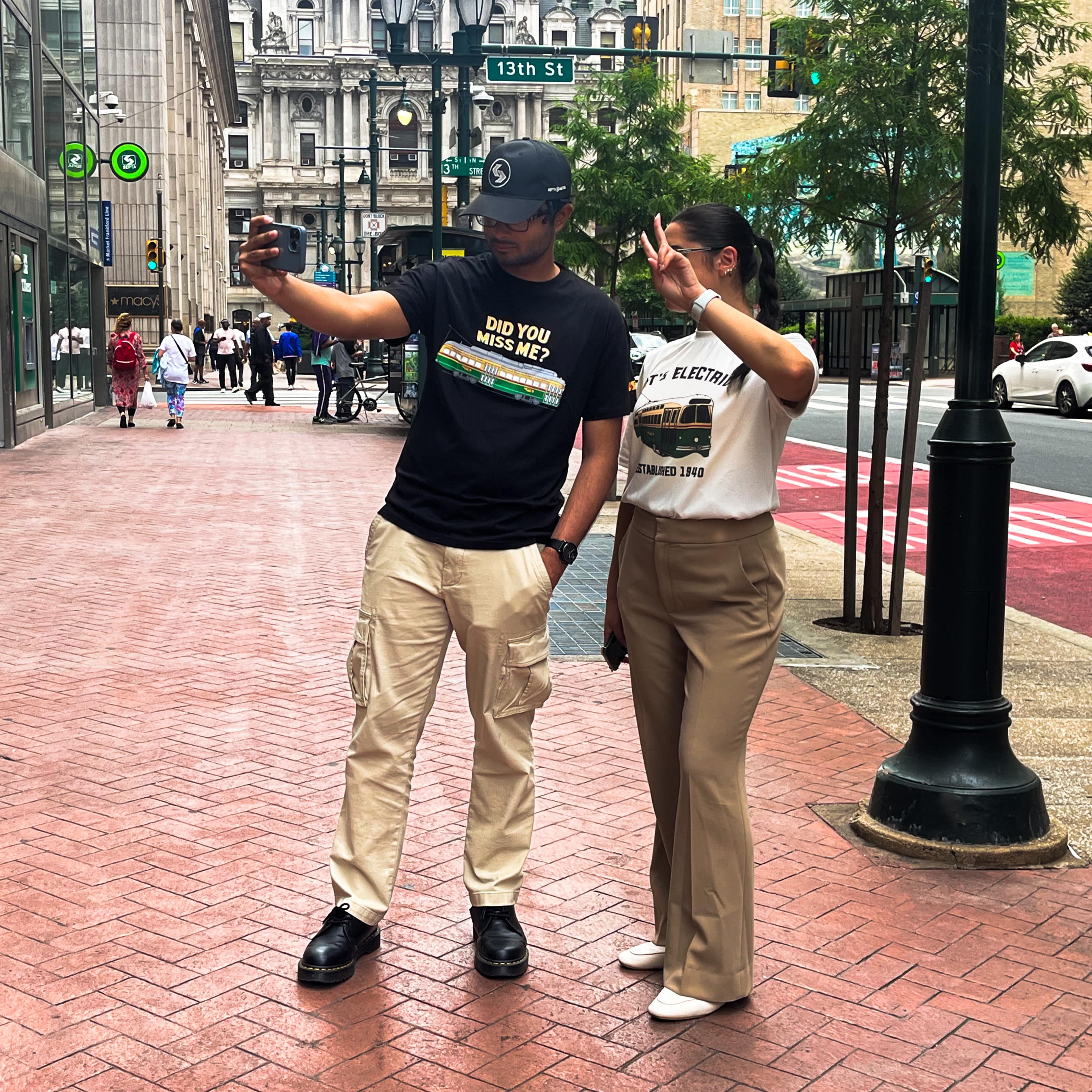 Two models wearing retro trolley tees